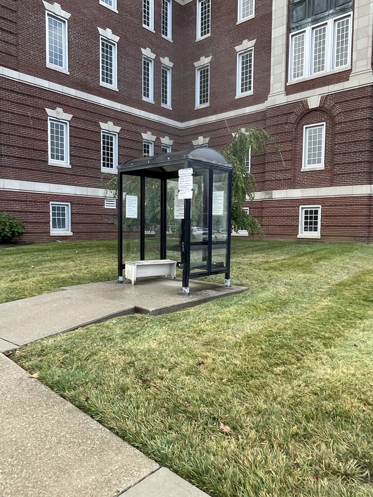 Image of a Bus Stop with Shelter and Seating